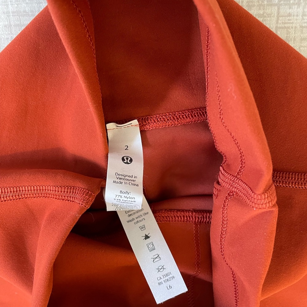 Lulu lemon high rise tights size 2 pumpkin